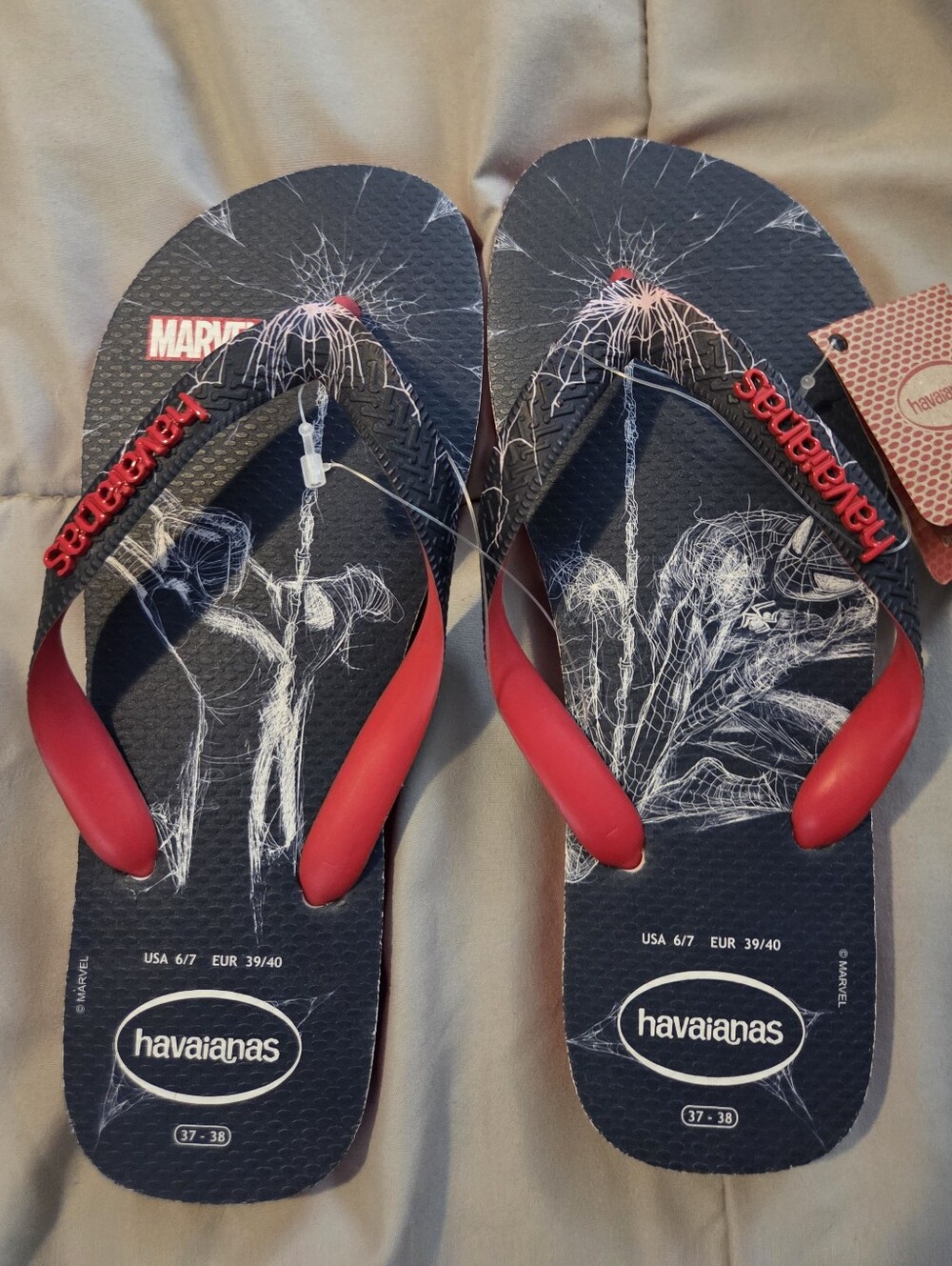 Brand new Havaianas Spider-Man Black Flip Flops with Red Straps.